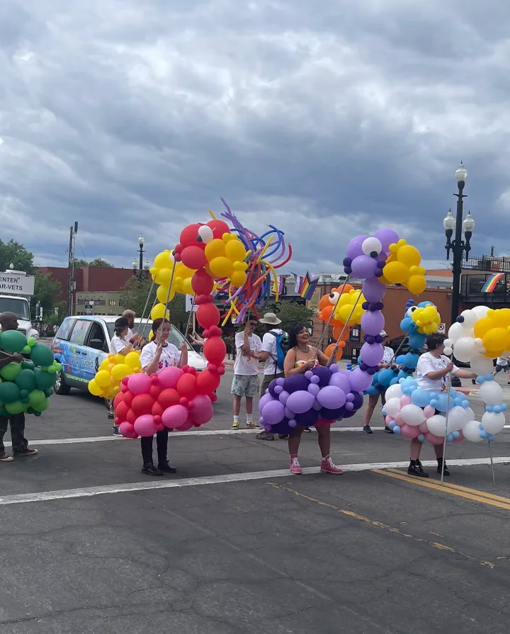 Costumed parade characters at a public community event